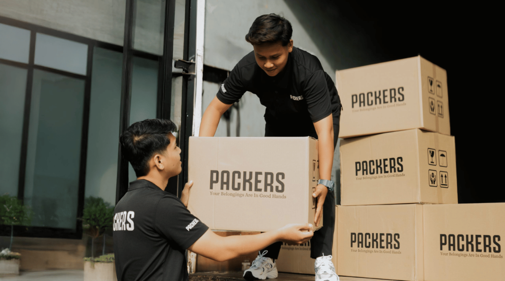 Assembling moving boxes at Movers Kuala Lumpur - Packers Xpress